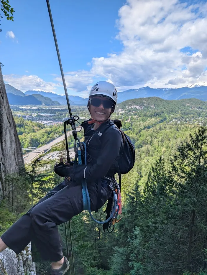 Lillian rappelling down to the South Gulley.