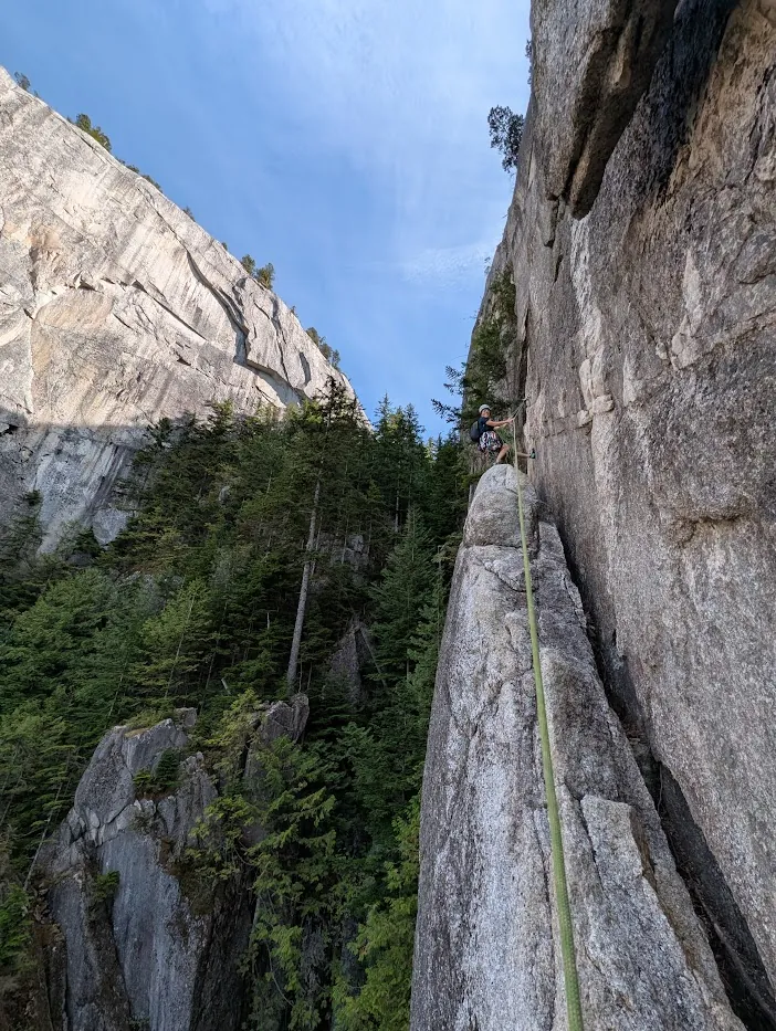 Lillian belaying me up to the base of the chimney pitch.