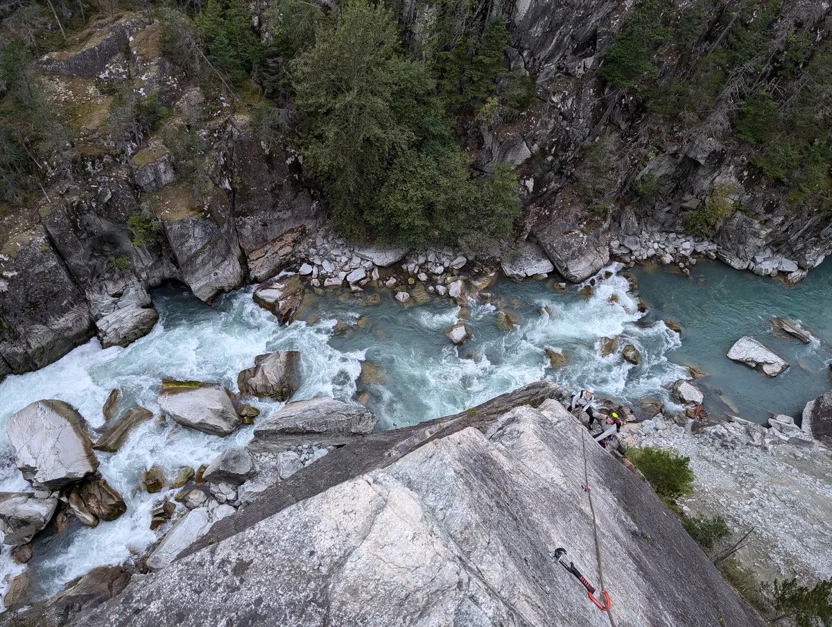 Looking straight down the slab to the turquoise whitewater of Cheakamus Canyon.