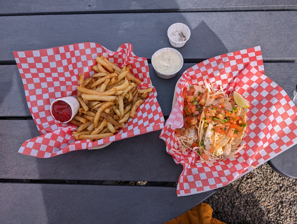 Surf Side lunch of fries, fish tacos, and tartar sauce.